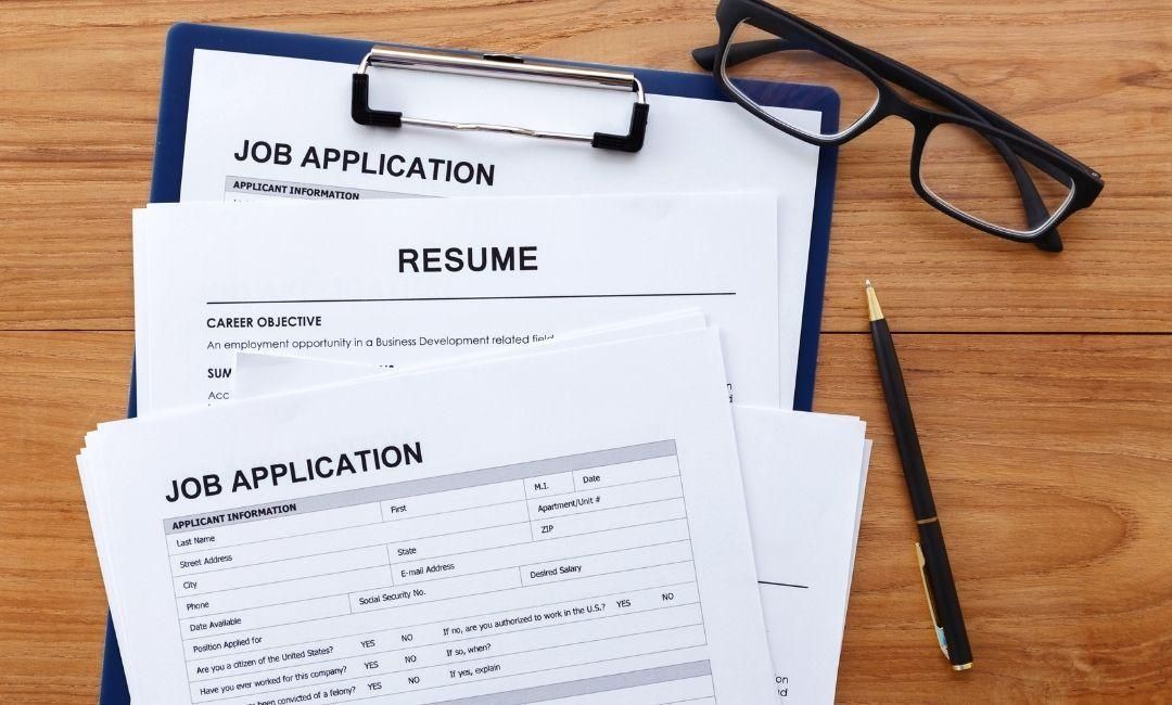 Job-application-and-resume-on-desk