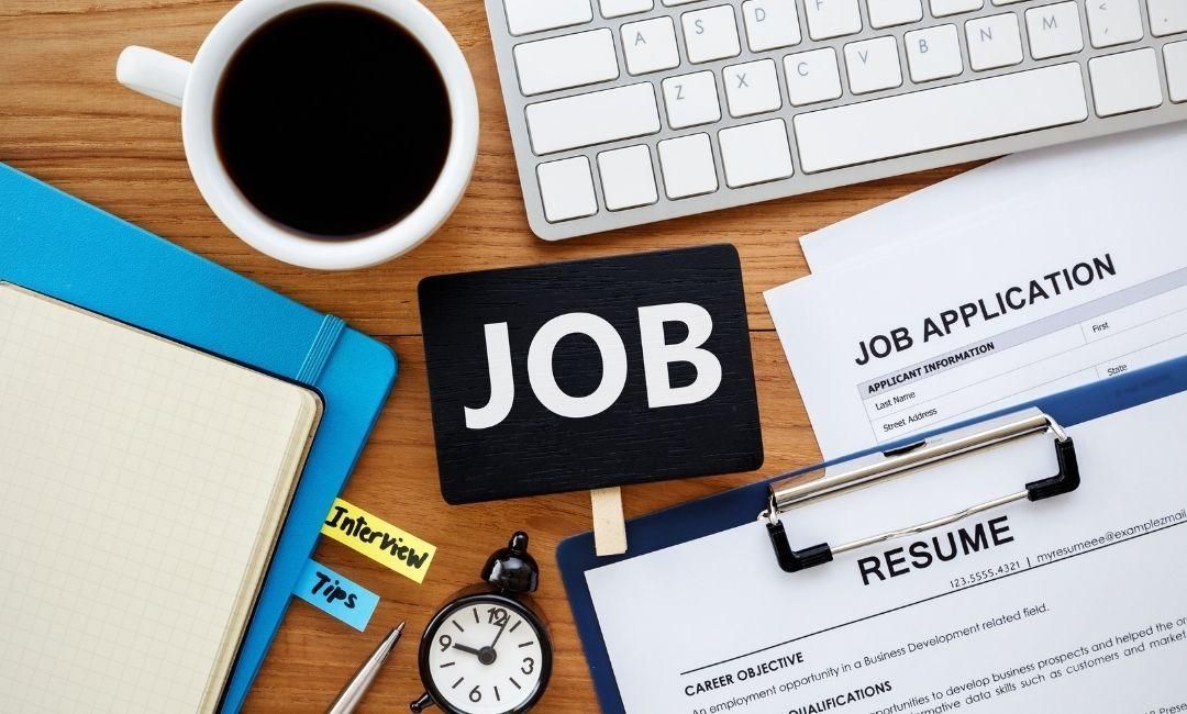 Job-sign-beside-application-and-resume