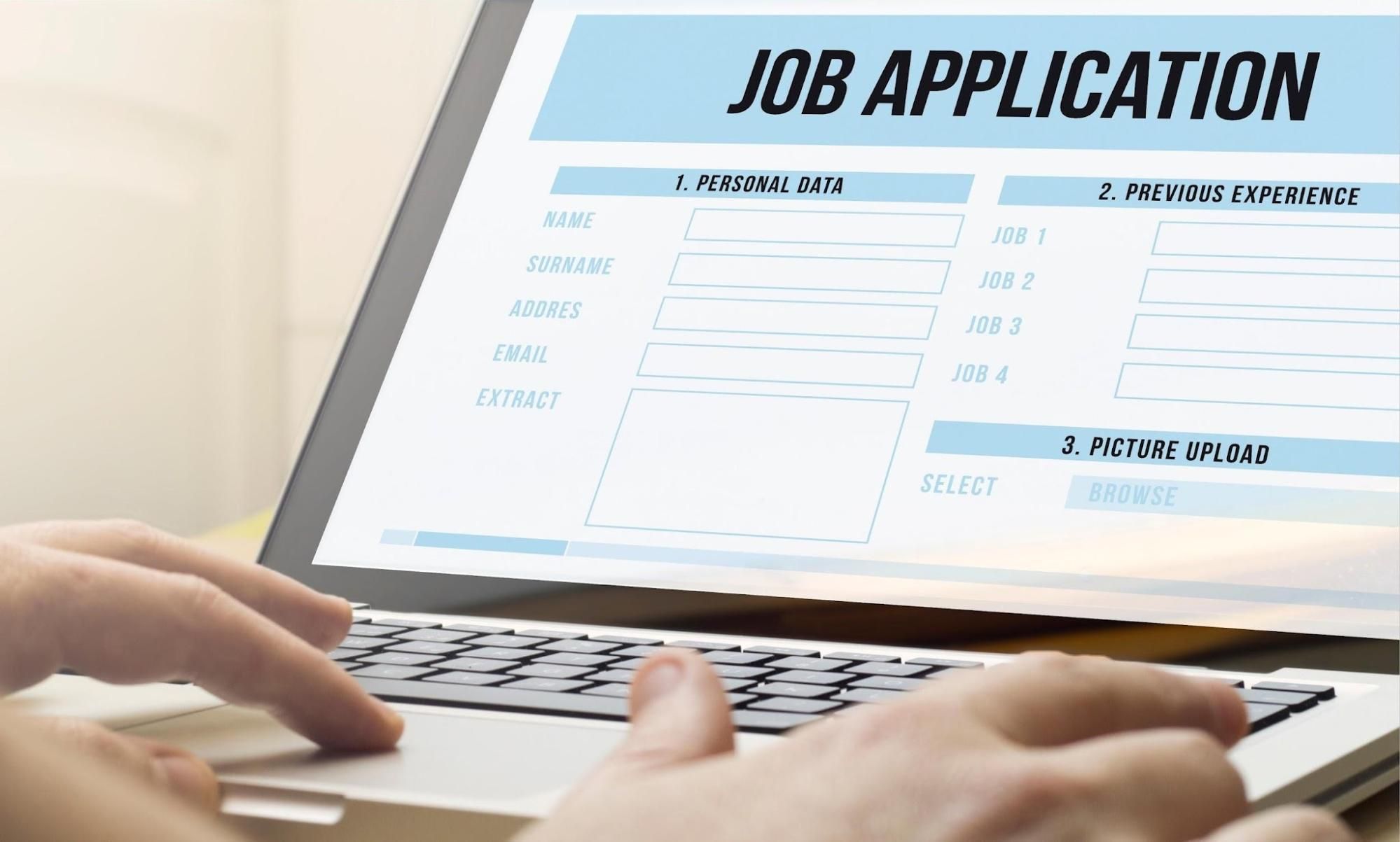Man filling job application form online