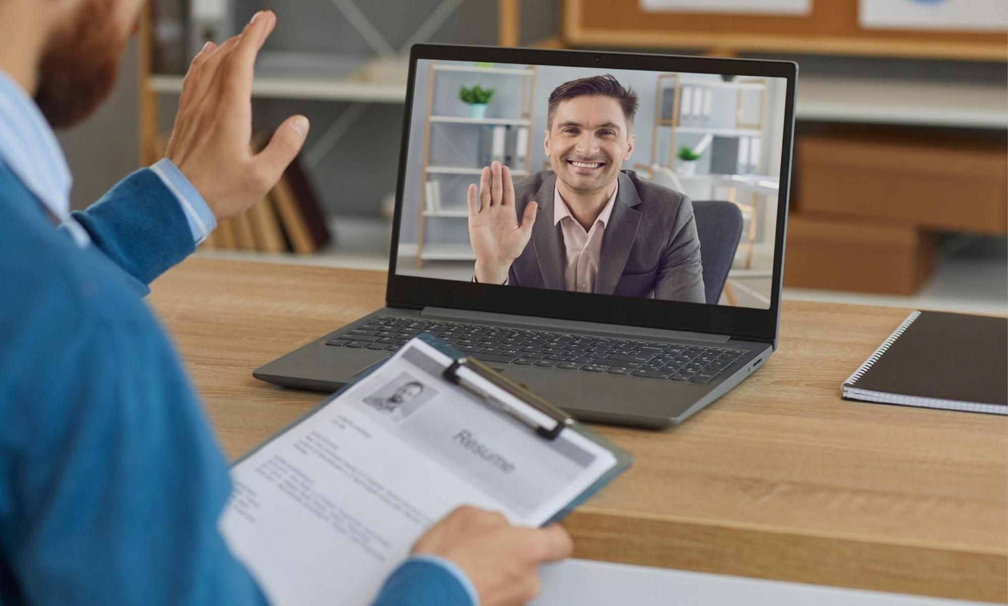 Recruiter conducting video interview with candidate