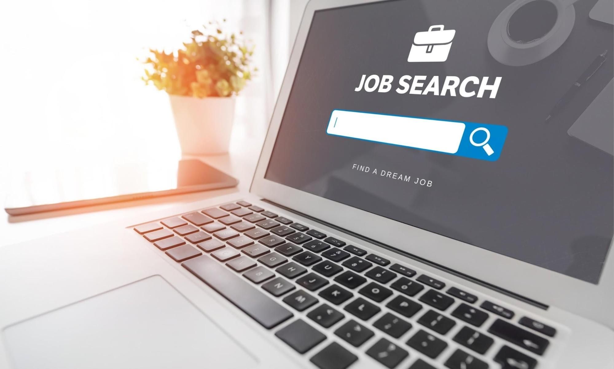 Job search website on laptop screen